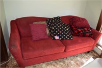 Sofa and pillows, blankets