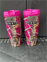 Two pink camouflage sheetz cups