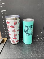 Two Christmas cups and lids