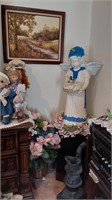 Ceramic angel, wall art, metal stove & floral
