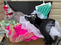 Girls box of clothing with pageant dresses