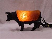Iron longhorn bull lamp w/ amber glass shade,