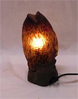 Iron jumping fish lamp w/ amber glass shade,
