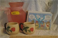 vase, cups, and sign