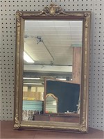 Wood framed wall mirror. Approx. 17.5” x 29.5”