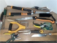 Assortment of pruning and gardening tools.