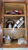 Cupboard contents, handheld mixer, teakettle,