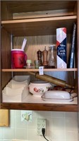 Cupboard contents, butter dish, rolling pin,