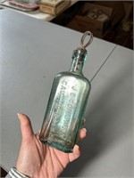 J.E. Combaults Caustic Balsam Bottle