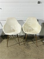 pair of vintage molded plastic chairs