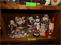 ALL THE SANTAS ON THE HALF SHELF ABOVE THE STICKER