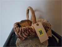 Basket of doilies, advertising plaques