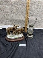 Deer figurine and small metal lantern