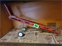 Vintage toy hay bale conveyor