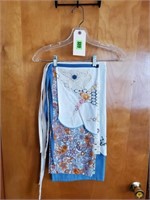 Handcrafted needlepoint & vintage linen aprons