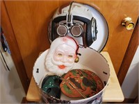 Hat box of vintage masks
