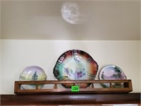 Shelf of china plates
