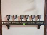 Shelf of pewter goblets (6)

Buyer has the