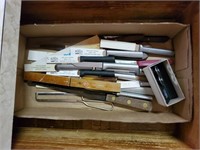 Contents of cutlery drawer, knife sharpener