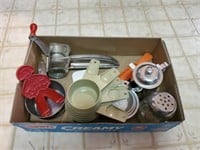 Kitchen utensils, measuring cups, cookie cutter,