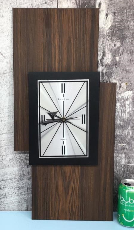 Vtg. Bulova faux wood wall clock