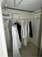Clothing & Plastic Shelves in Closet