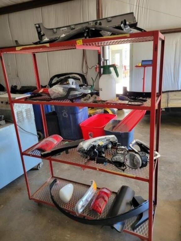 RED ROLLING SHELF W/NEW AND USED AUTO PARTS