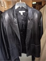 Tweeds small leather jacket, 30 inches long.