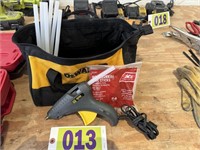 Stanley glue gun, glue sticks, and Dewalt tool bag