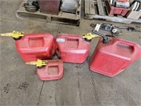 4 plastic gas cans  - in shop