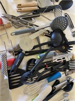 Box of kitchen utensils including knives, mallet,