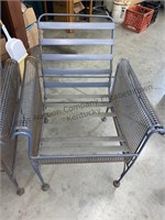 Two metal framed chairs no cushions