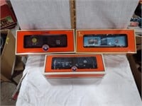 Three Lionel Model Train Cars in OG Boxes