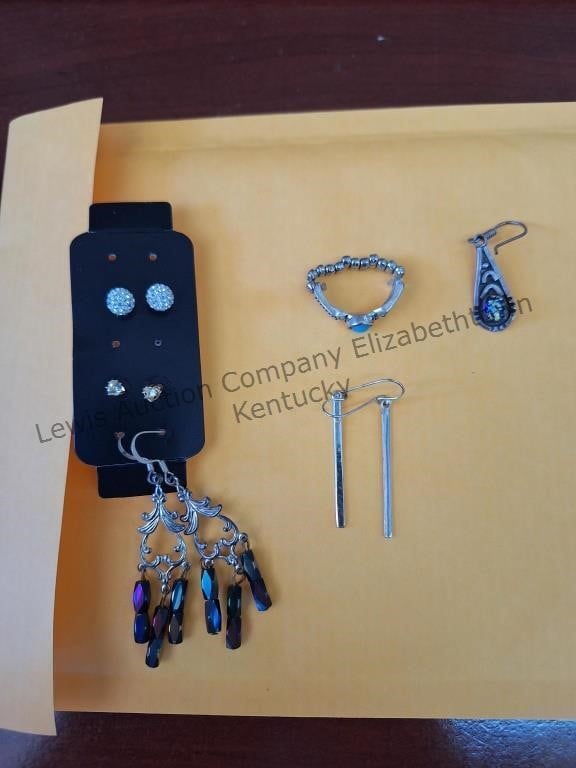 Costume jewelry in envelope.
4 pair of earrings