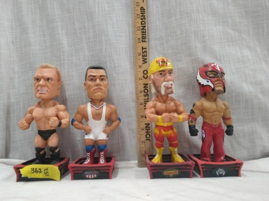 Four WWE Wrestling Bobble Heads