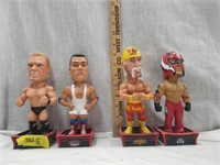 Four WWE Wrestling Bobble Heads