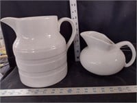 Two Vintage White Ceramic Pitchers