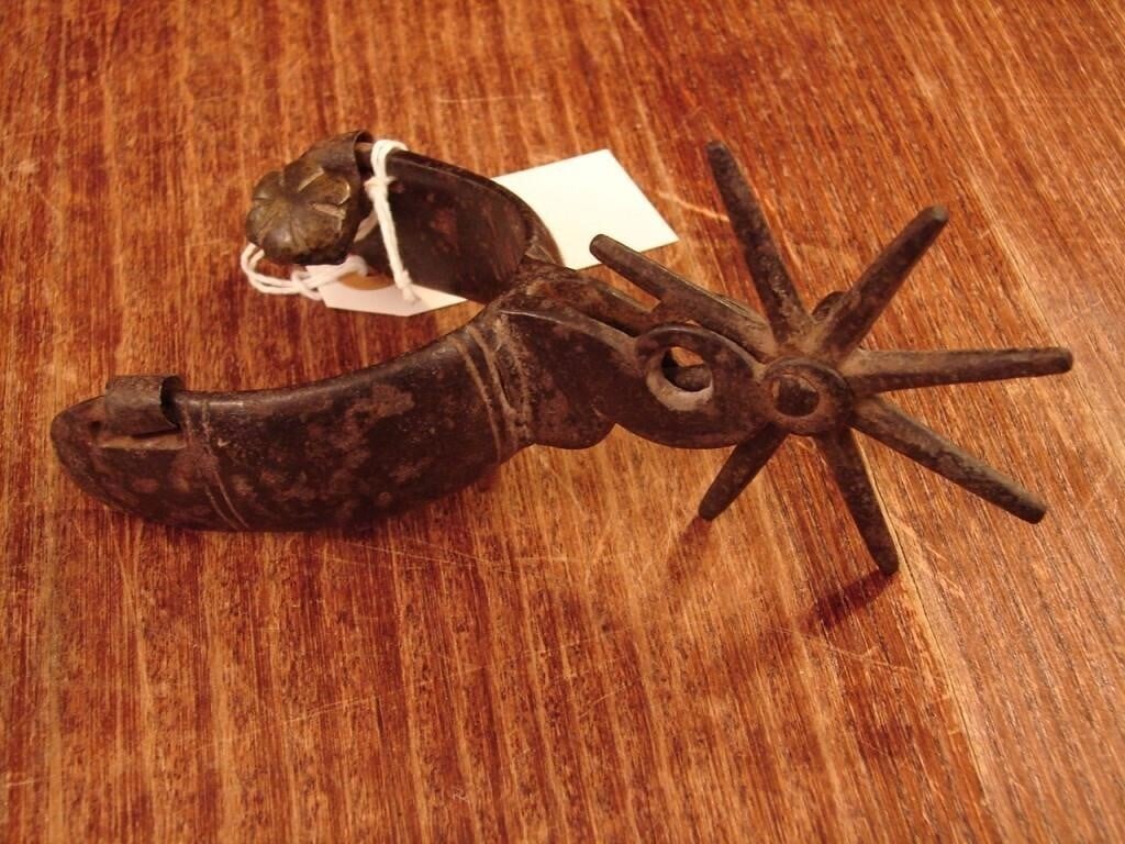Single unmatched Mexican large rowel spur
