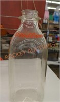 Vintage woodlawn glass milk bottle