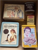 A vintage Betty Crocker cookbook, vintage tins ,