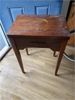 Old sewing machine table without the machine 22”x