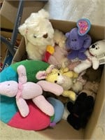 Two boxes of stuffed animals and Ty babies