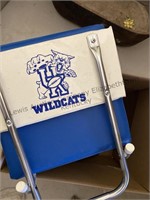 Two stadium seats “ says Kentucky” and a box of
