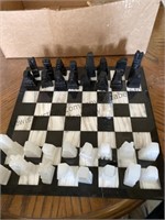 Assumed marble chess and checker board. All