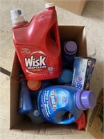 Box lot of cleaning supplies and a box with max