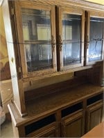 Two piece lighted china hutch . Missing 3 drawers