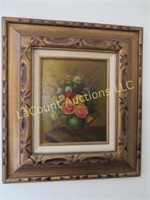 floral painting w ornate frame