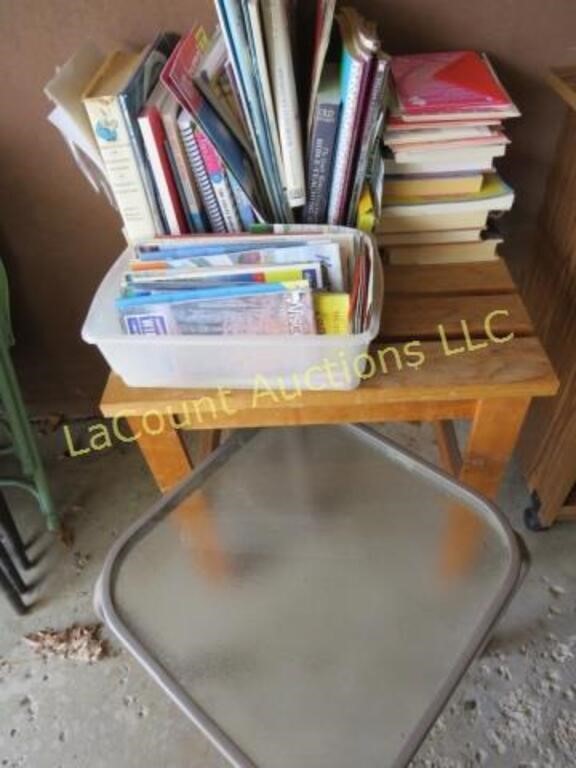wood table another and assorted books maps