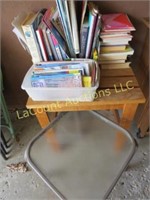 wood table another and assorted books maps