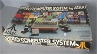 Atari video game system in box. Model CX-2600